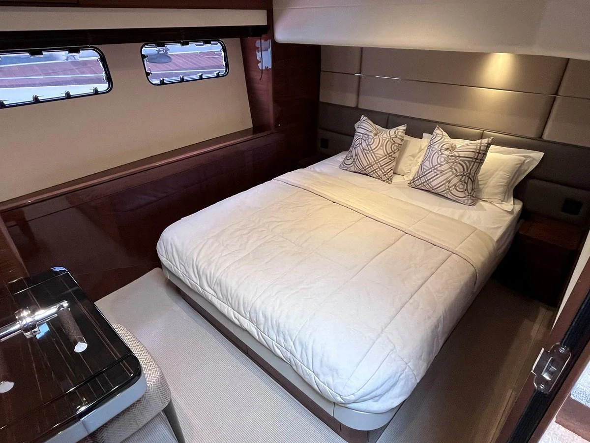 A cozy stateroom with a comfortable double bed and elegant decor. aboard PRINCESS CHLOE Yacht for Sale