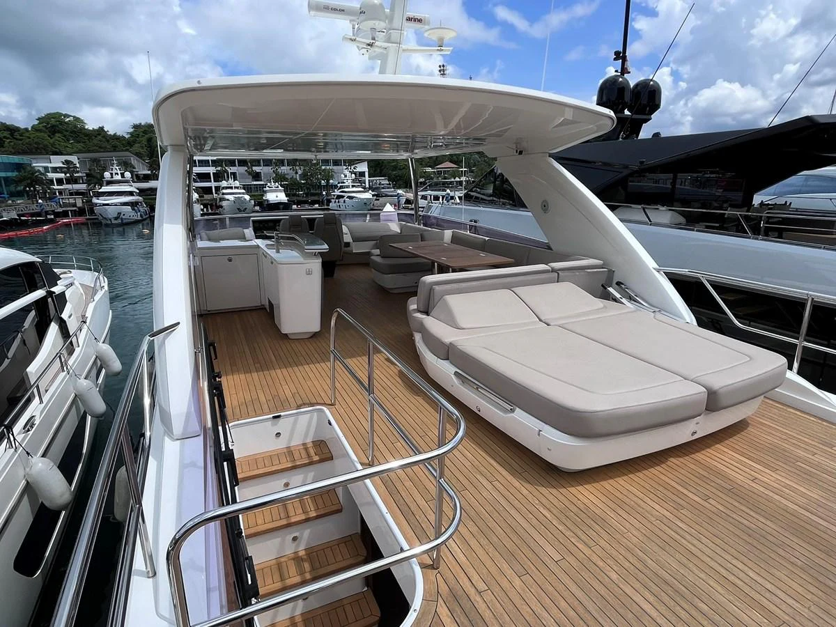 The flybridge offers spacious seating and lounging areas with a sleek, modern design. aboard PRINCESS CHLOE Yacht for Sale