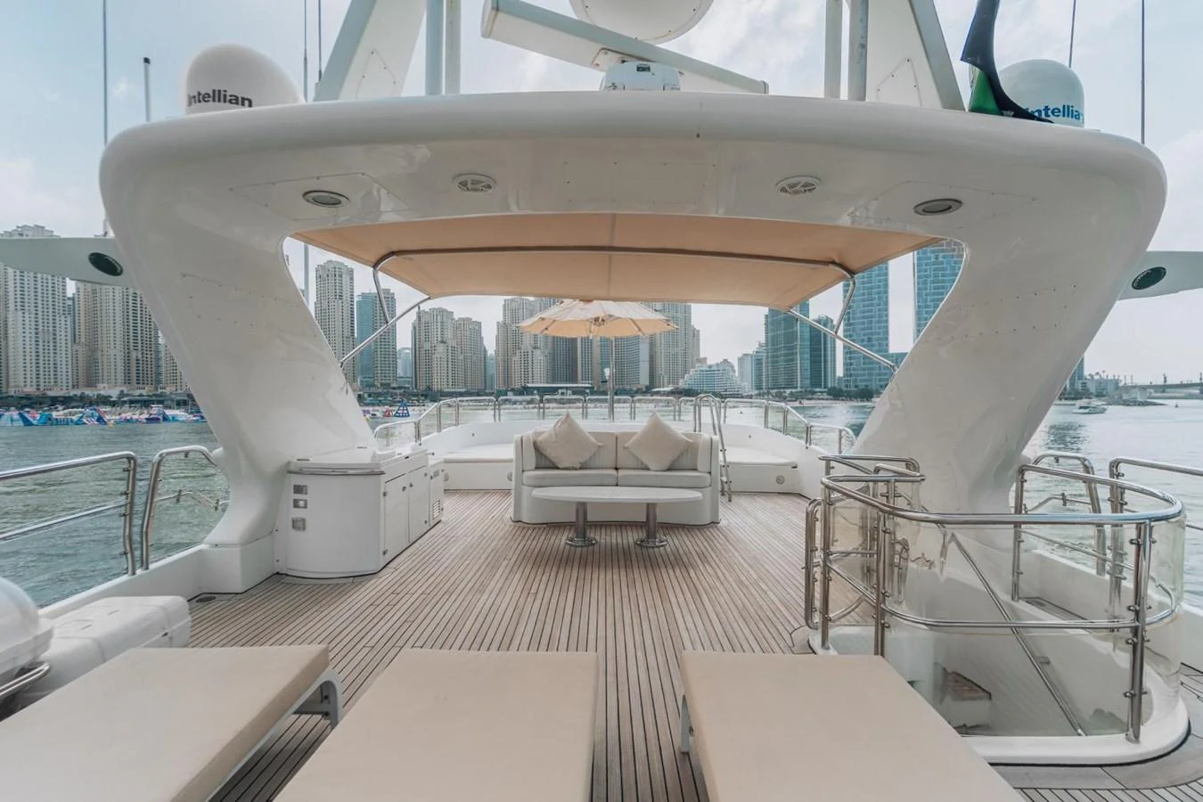 The aft deck offers a spacious and inviting area for relaxation with comfortable seating and a shaded canopy. aboard GALLUS Yacht for Sale