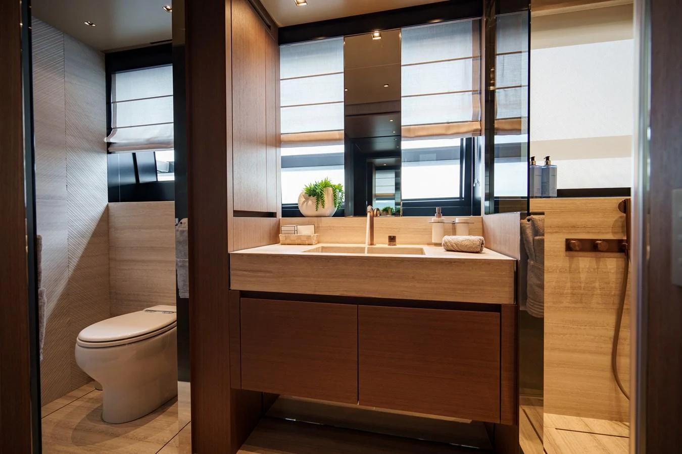 The yacht's bathroom features modern fixtures and a sleek design. aboard DESTINO Yacht for Sale