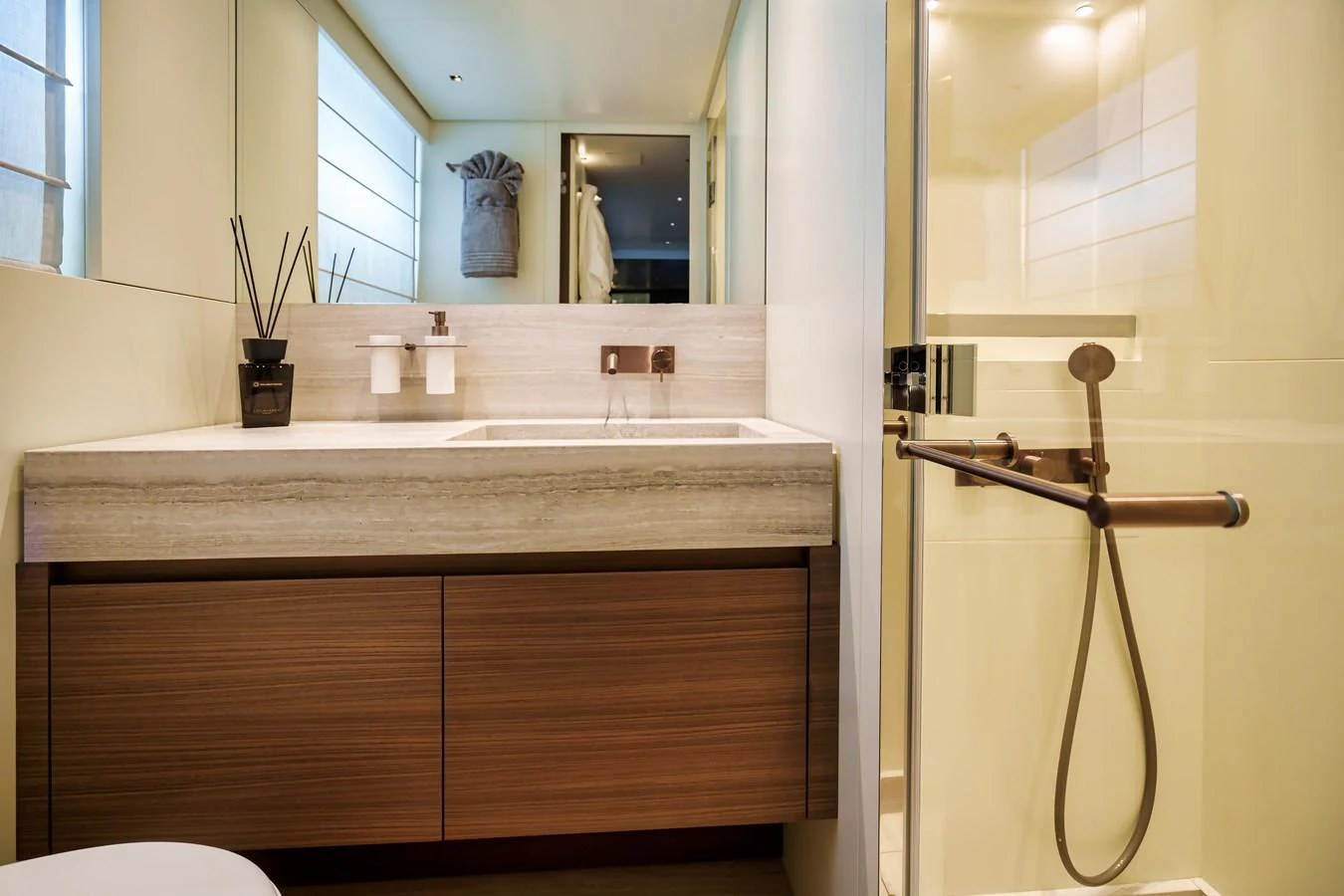 The yacht's bathroom features modern fixtures and a sleek design. aboard DESTINO Yacht for Sale