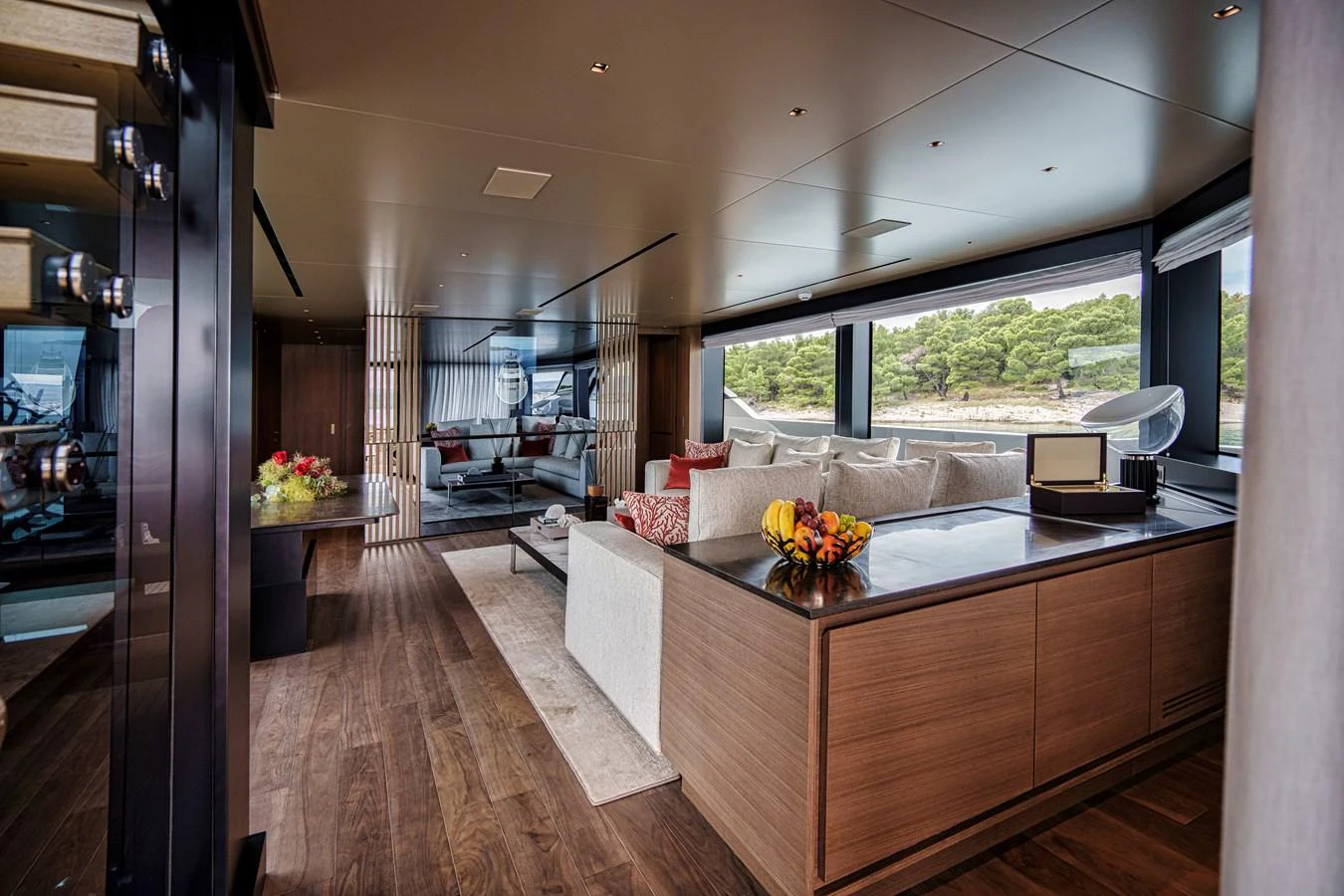 The salon features elegant furnishings and large windows offering panoramic views. aboard DESTINO Yacht for Sale