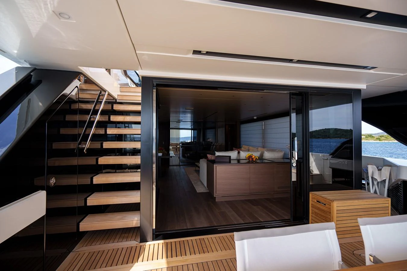 The image showcases a luxurious salon area with modern furnishings and an inviting ambiance. aboard DESTINO Yacht for Sale