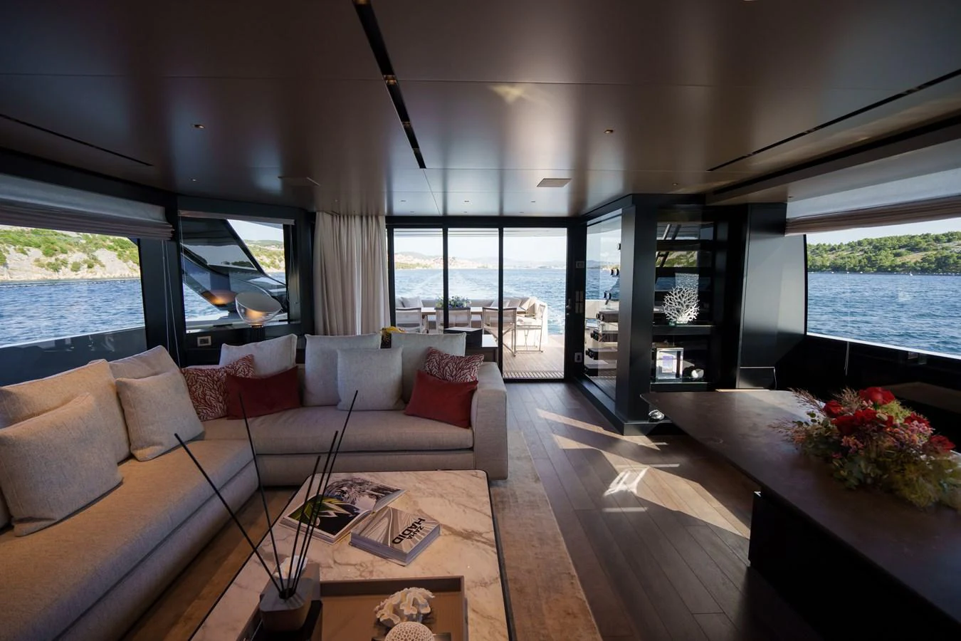 The salon offers a spacious and elegant area with panoramic views of the surrounding waters. aboard DESTINO Yacht for Sale