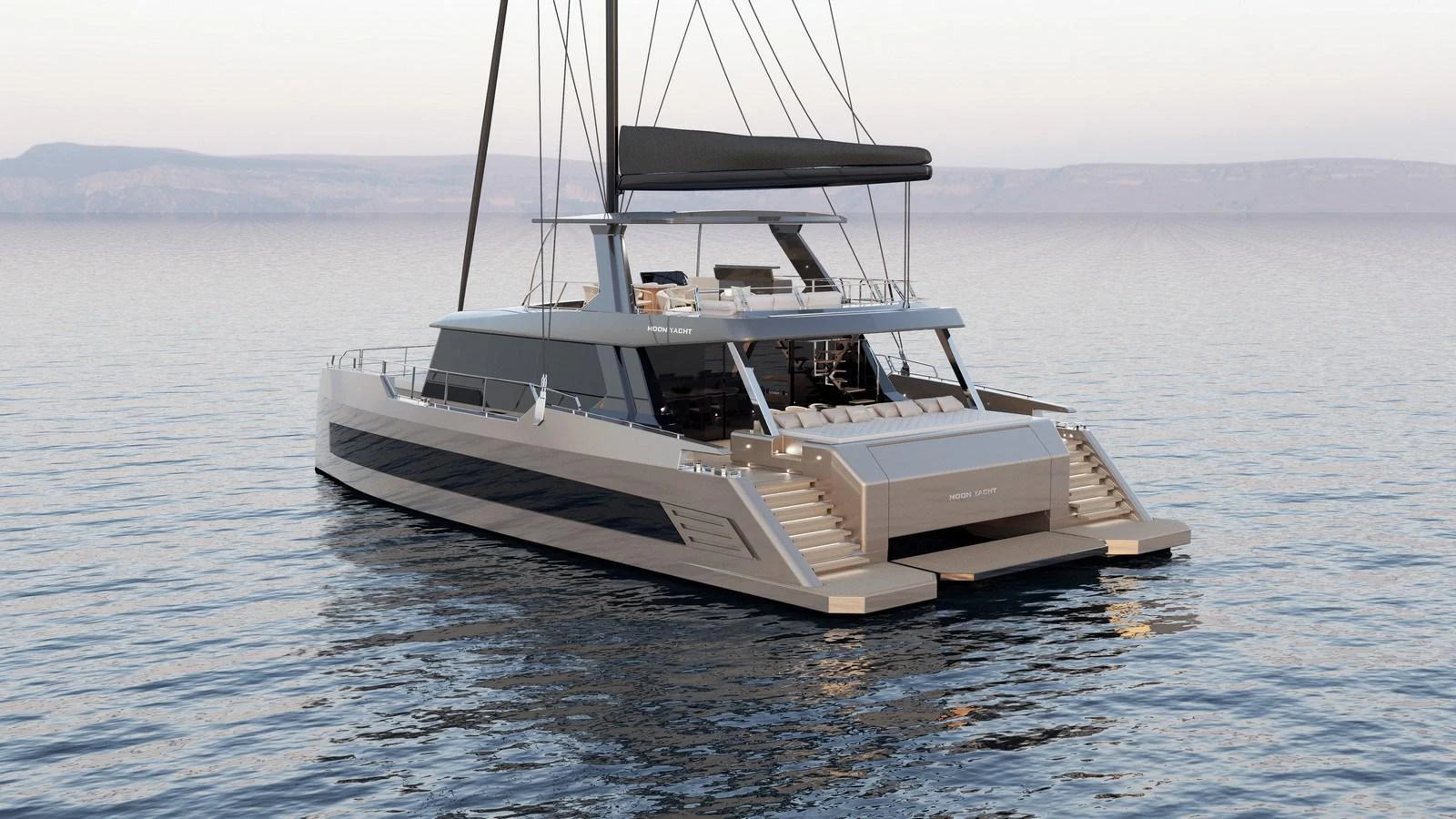 A sleek and modern catamaran yacht glides gracefully on calm waters. aboard MOON 70 SAIL Yacht for Sale