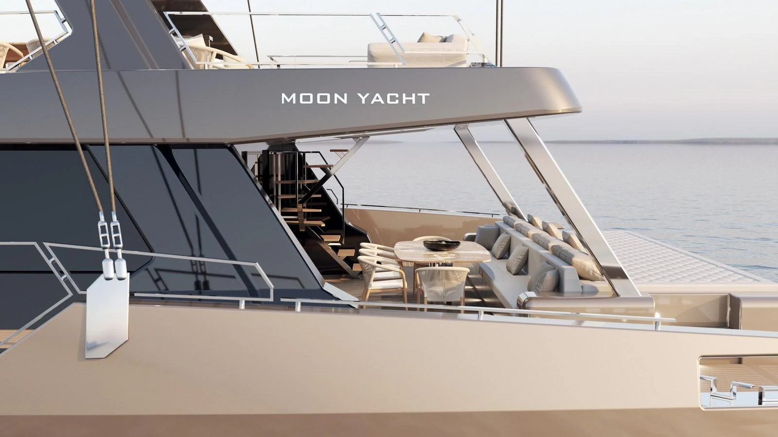 The aft deck of this yacht features a stylish seating area with a dining table, perfect for alfresco dining. aboard MOON 70 SAIL Yacht for Sale