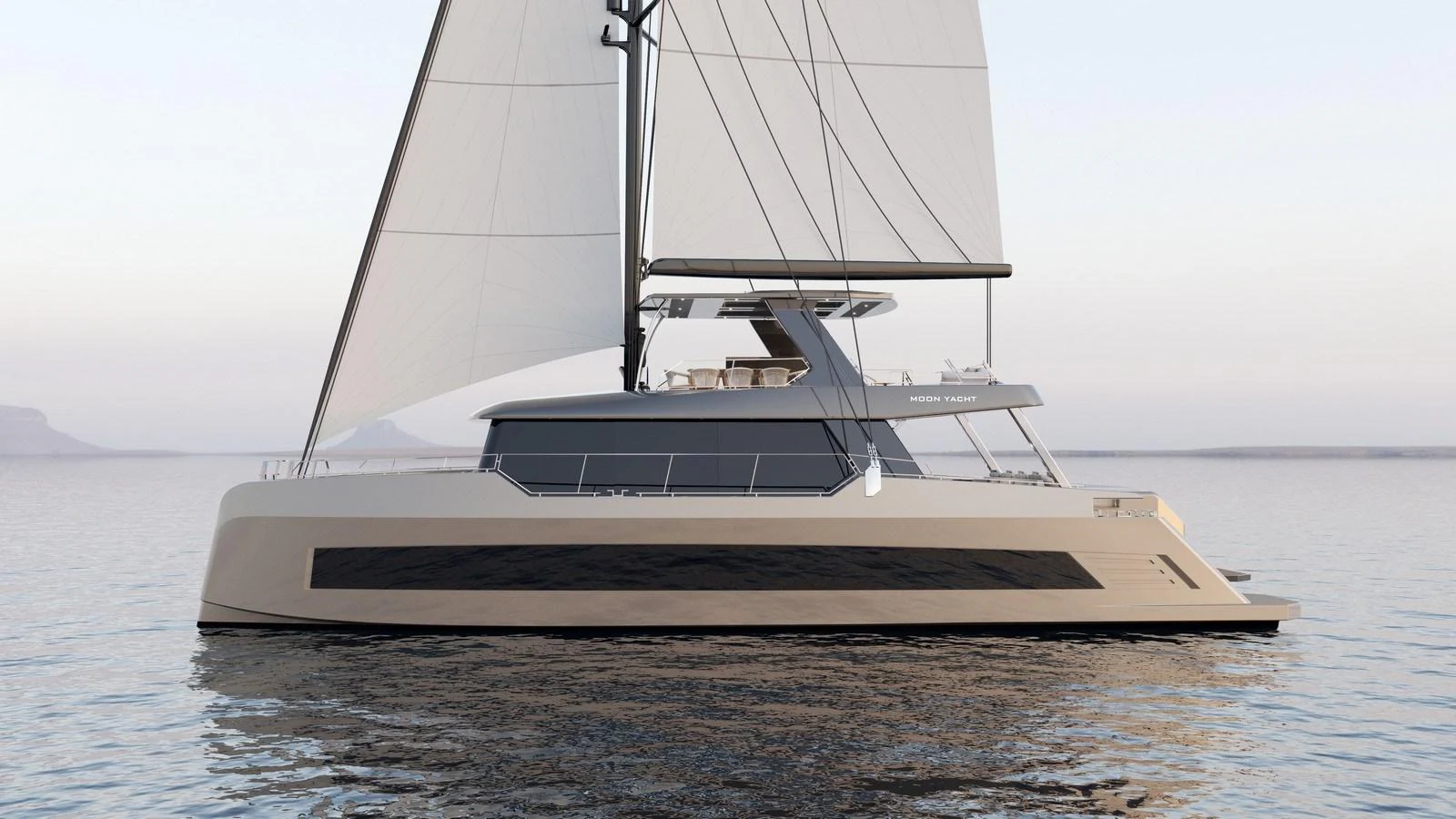 A sleek and modern sailing yacht glides gracefully on calm waters. aboard MOON 70 SAIL Yacht for Sale