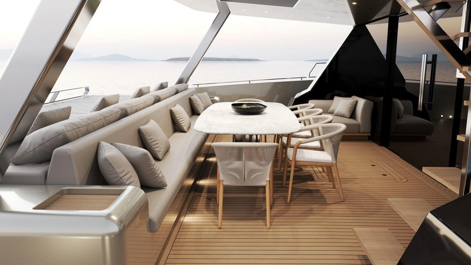 The aft deck features a stylish dining area with comfortable seating and a scenic view. aboard NEW MOON 70 POWER Yacht for Sale