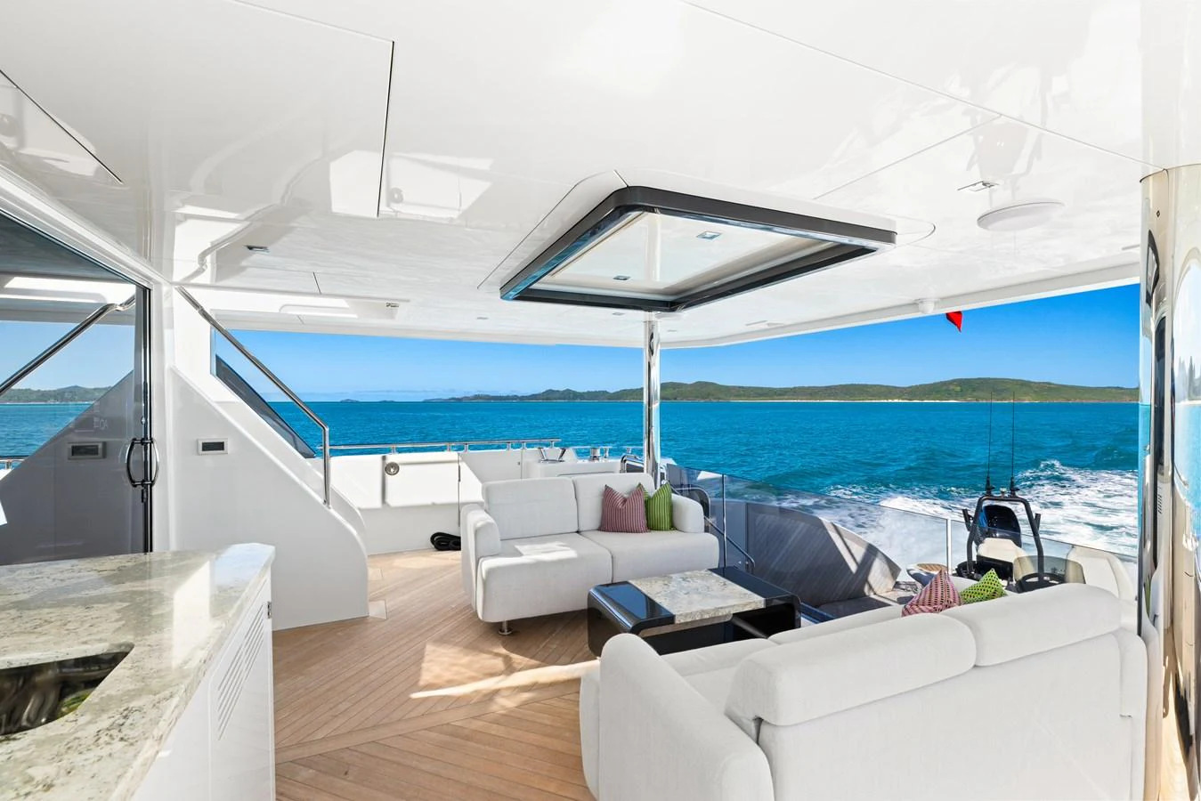 The aft deck offers a spacious and comfortable lounging area with stunning ocean views. aboard G Yacht for Sale