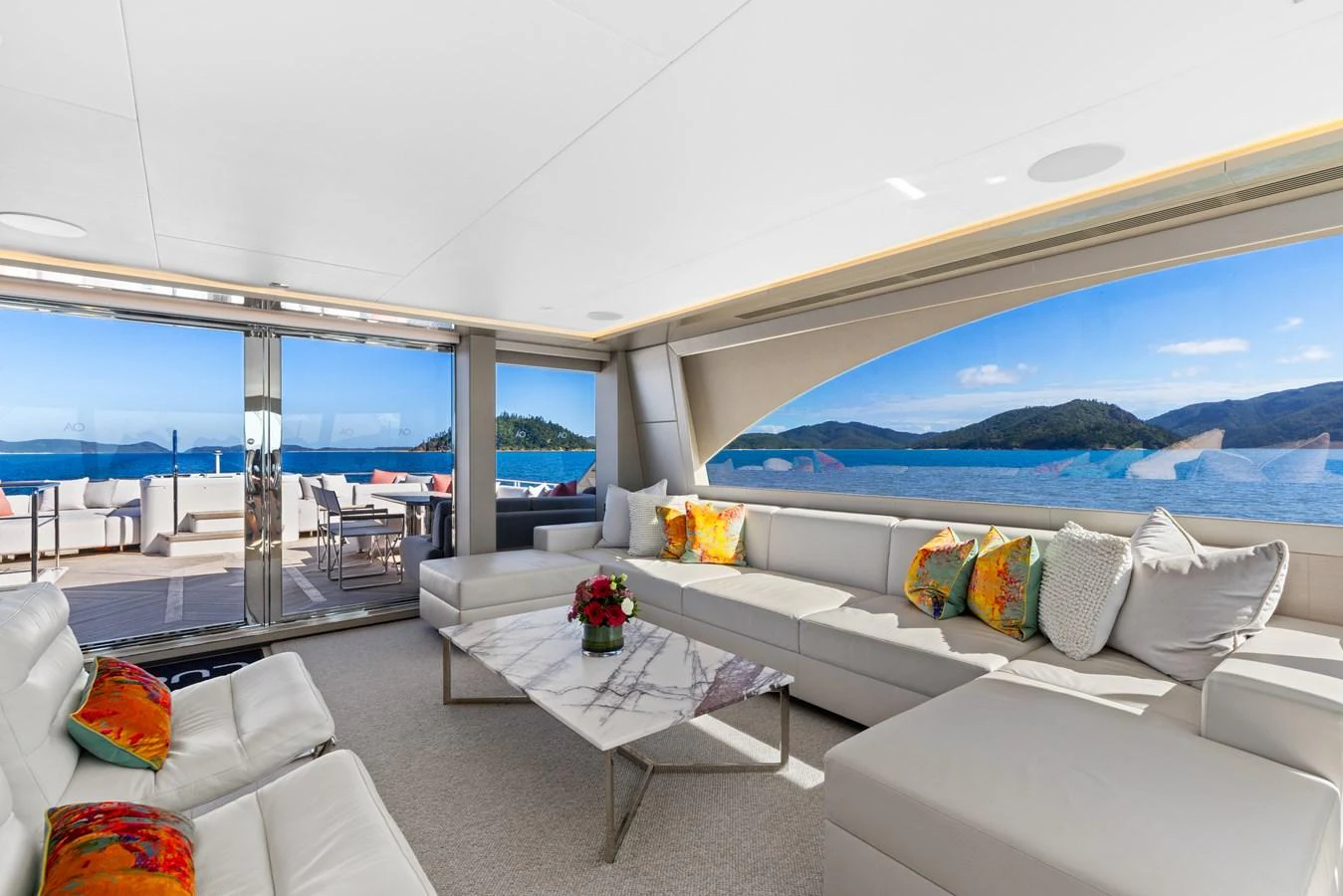 The salon offers a spacious and luxurious seating area with stunning views of the sea. aboard G Yacht for Sale
