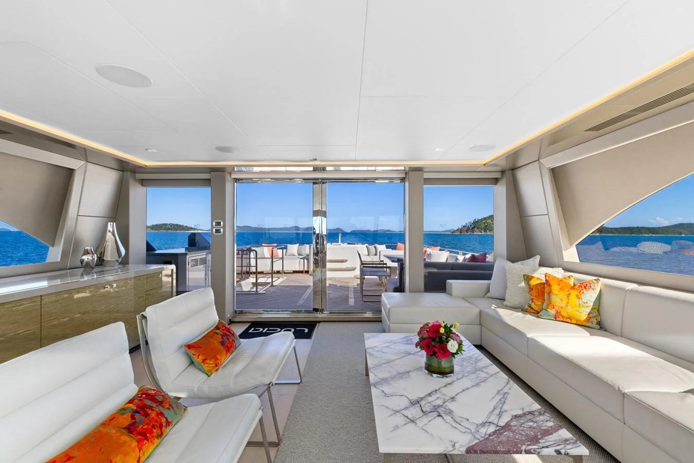 The salon offers a spacious and elegant area with comfortable seating and stunning views of the sea. aboard G Yacht for Sale