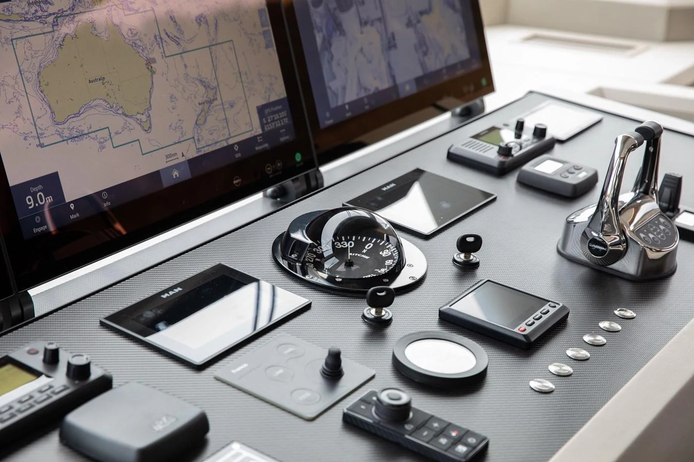 The helm station features advanced navigation and control equipment. aboard G Yacht for Sale