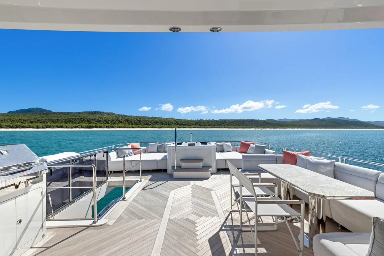 The aft deck offers a spacious seating area with stunning ocean views. aboard G Yacht for Sale
