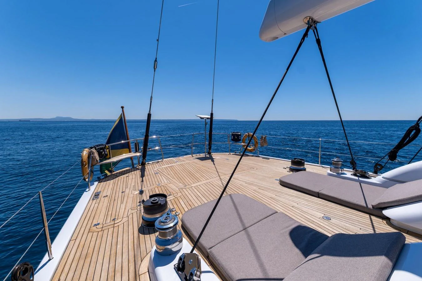The yacht's deck offers a spacious and inviting area for relaxation and enjoyment under the open sky. aboard EPIPHANY Yacht for Sale