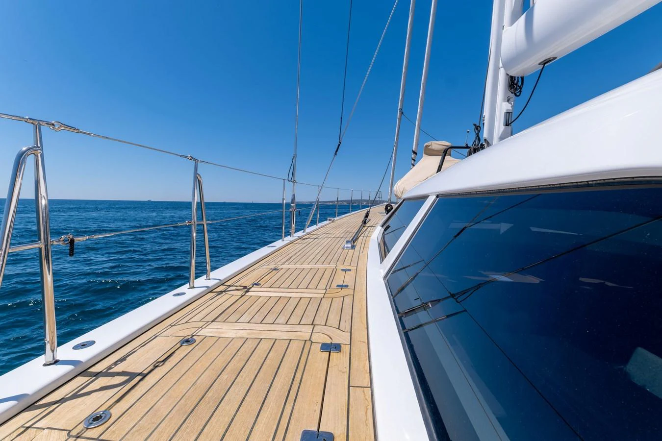 The yacht's deck offers a spacious and sleek area for enjoying the open sea. aboard EPIPHANY Yacht for Sale