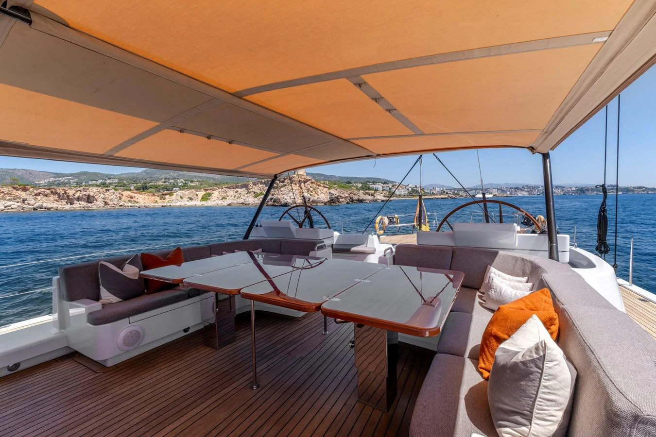 The aft deck offers a spacious and shaded area with comfortable seating and stunning sea views. aboard EPIPHANY Yacht for Sale