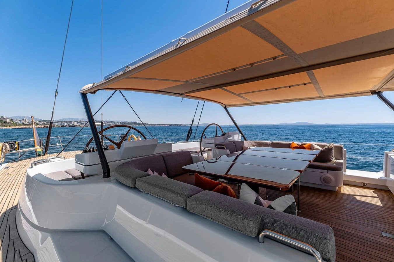 The aft deck offers a spacious and shaded area for relaxation and dining with stunning sea views. aboard EPIPHANY Yacht for Sale