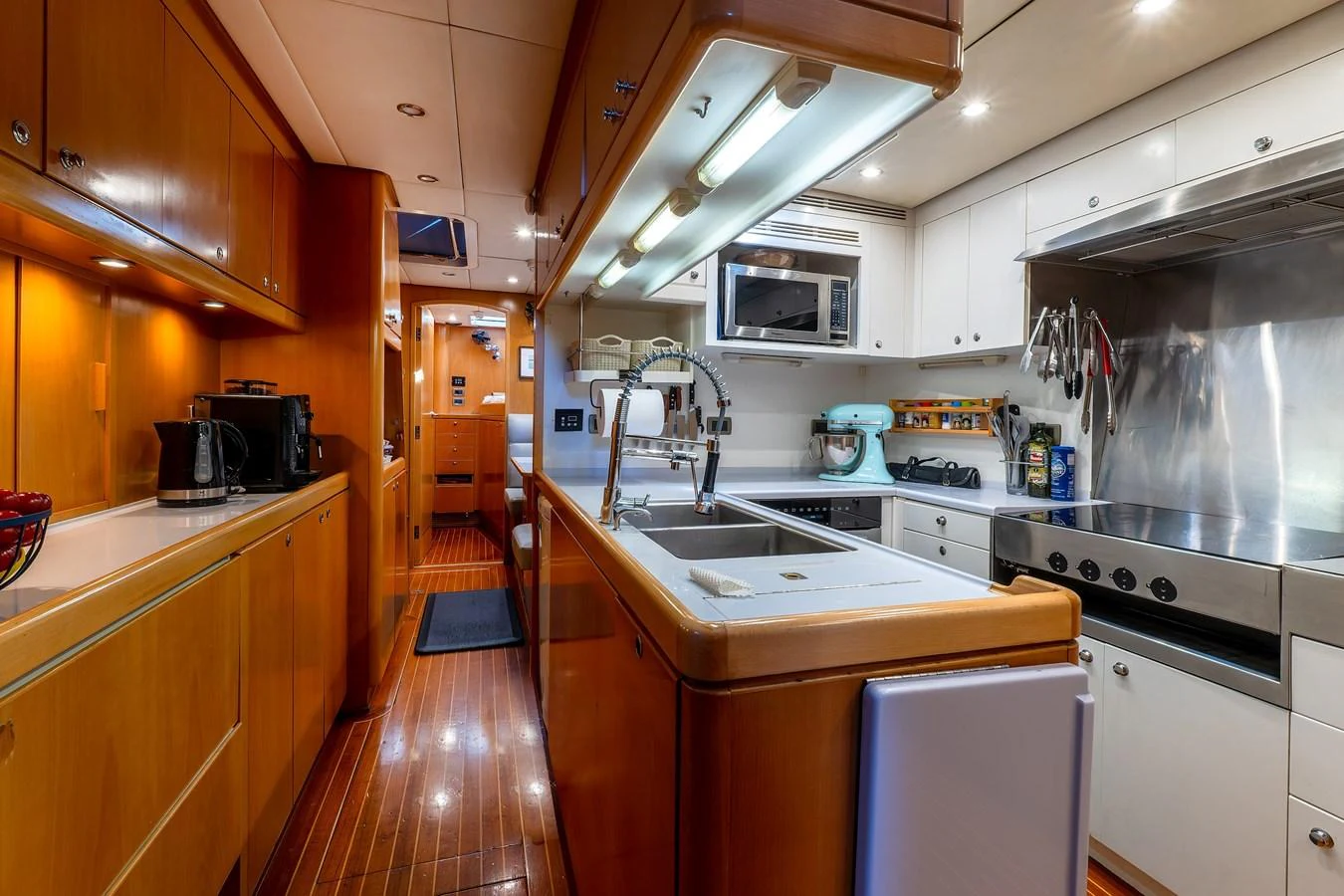 The galley is equipped with modern appliances and ample counter space, perfect for gourmet meal preparation. aboard EPIPHANY Yacht for Sale
