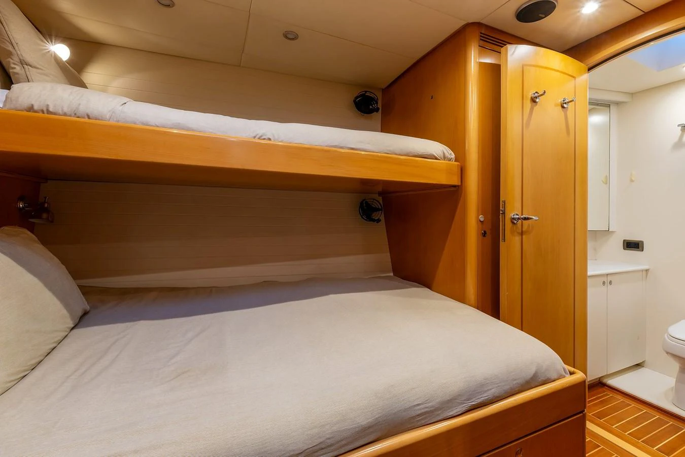The cozy cabin features comfortable bunk beds and a private en-suite bathroom. aboard EPIPHANY Yacht for Sale