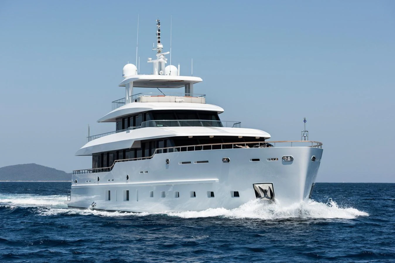 A sleek and modern yacht glides effortlessly through the open water. aboard K Yacht for Sale