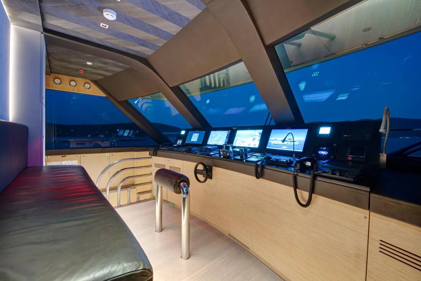 The helm station features state-of-the-art navigation equipment and a sleek, modern design. aboard K Yacht for Sale