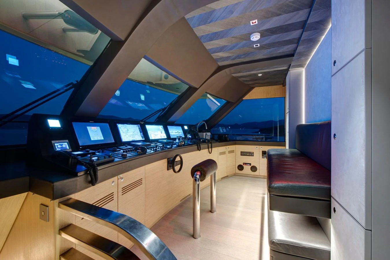 The helm station features state-of-the-art navigation equipment and a sleek, modern design. aboard K Yacht for Sale