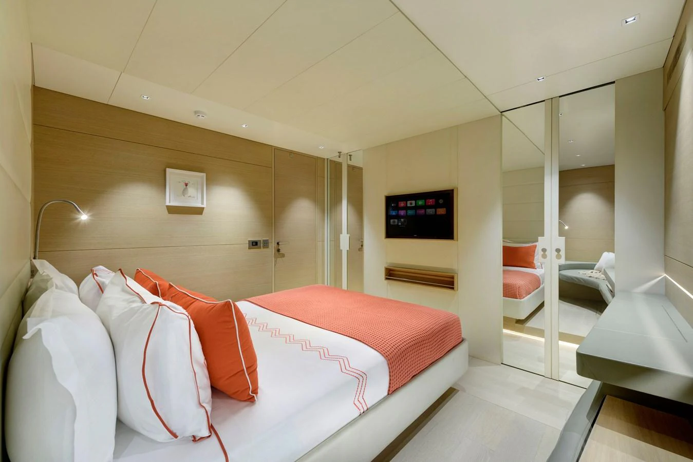 A luxurious stateroom featuring a comfortable bed and modern amenities. aboard K Yacht for Sale