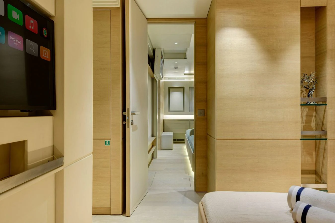 The yacht's interior features a modern and sleek design with light wood finishes and a cozy atmosphere. aboard K Yacht for Sale