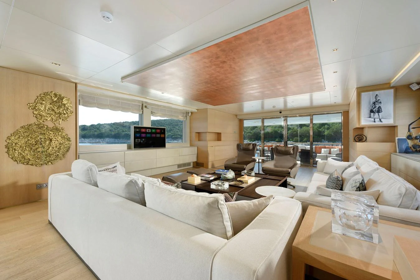 The salon features luxurious seating with panoramic views and modern decor. aboard K Yacht for Sale