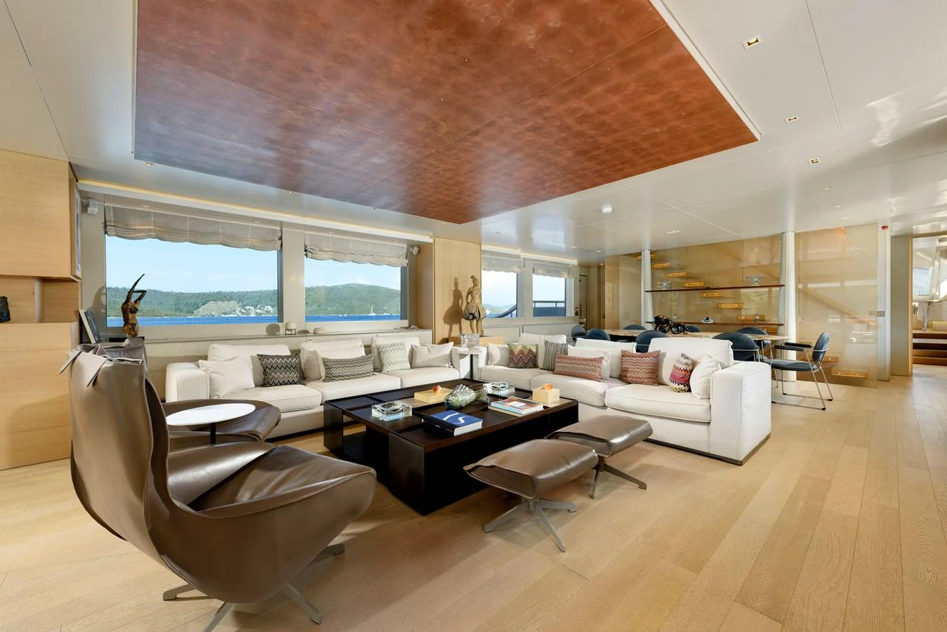 The spacious salon features luxurious seating with panoramic views. aboard K Yacht for Sale