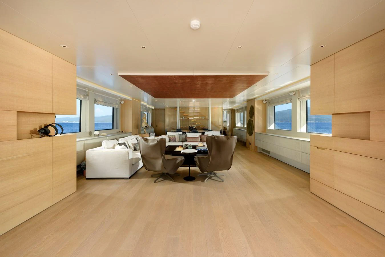 The spacious salon features modern furnishings and ample natural light. aboard K Yacht for Sale