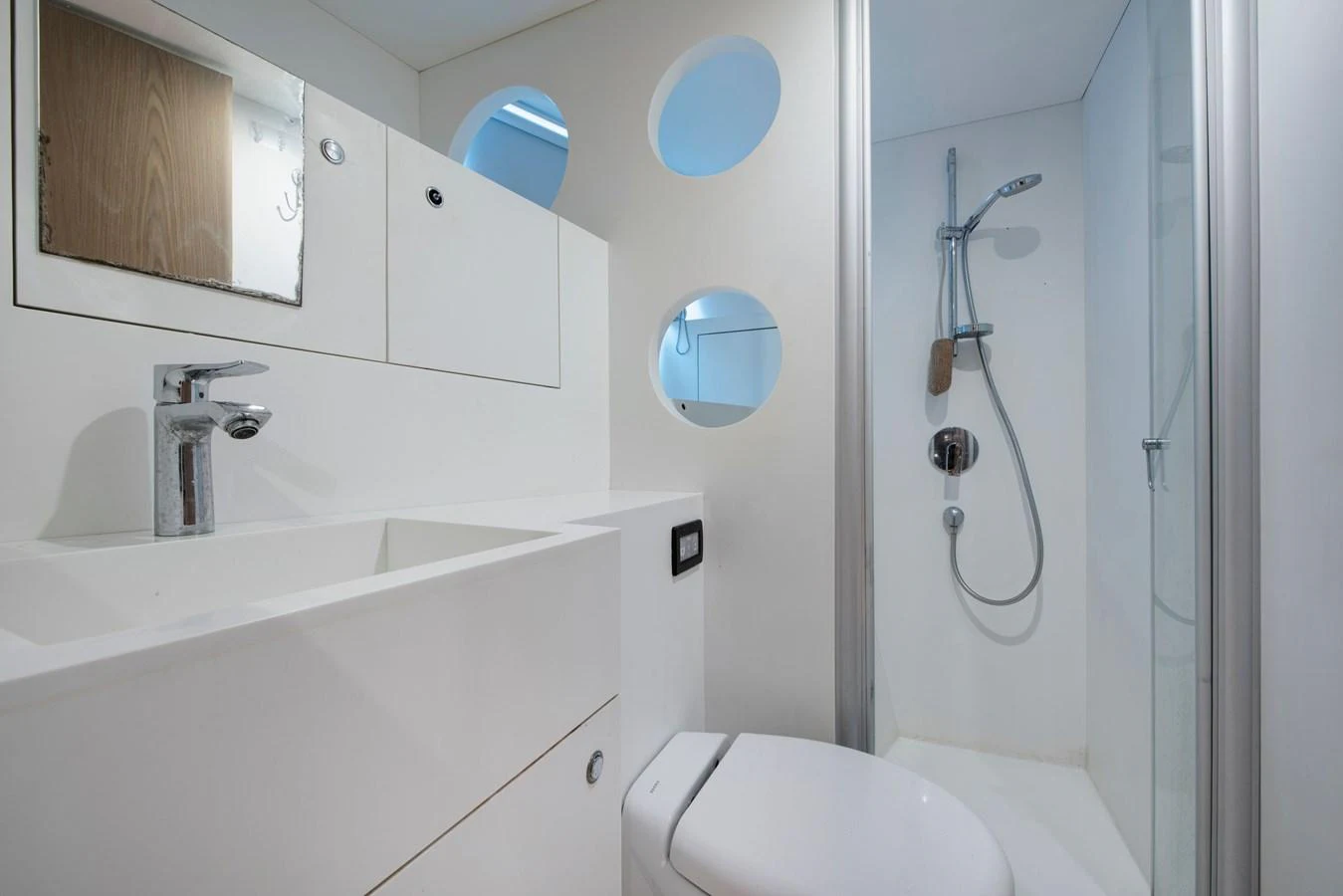 A modern yacht bathroom with sleek fixtures and a minimalist design. aboard K Yacht for Sale