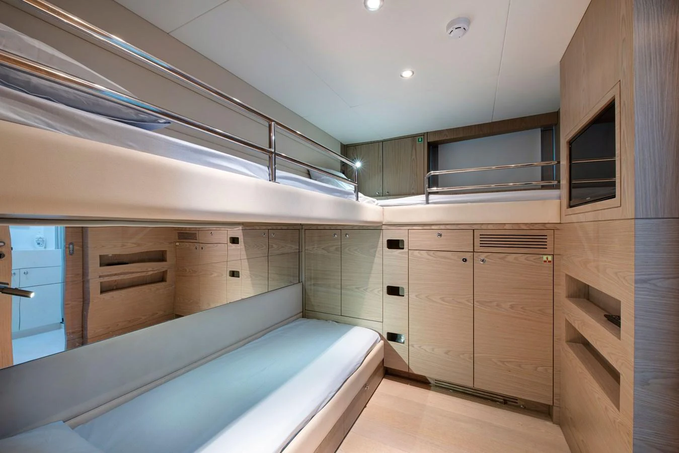 The crew quarters feature practical bunk beds and ample storage space in a well-lit, modern setting. aboard K Yacht for Sale