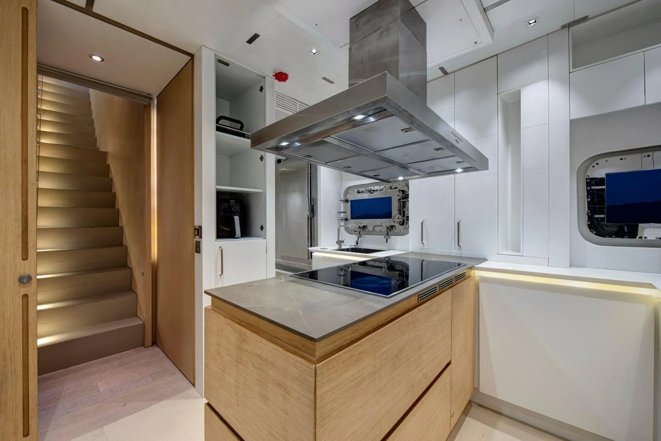 The galley features modern appliances and sleek cabinetry, creating a functional and stylish cooking space. aboard K Yacht for Sale