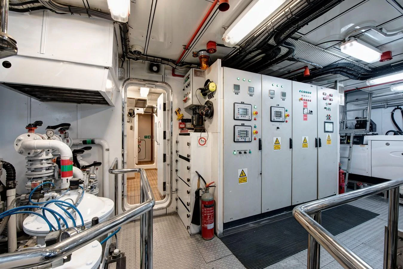 The engine room is equipped with advanced control panels and essential machinery, ensuring optimal performance and safety. aboard K Yacht for Sale