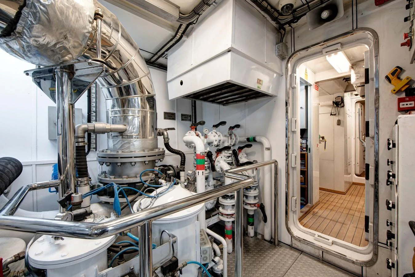 The yacht's engine room is equipped with advanced machinery and well-organized systems. aboard K Yacht for Sale
