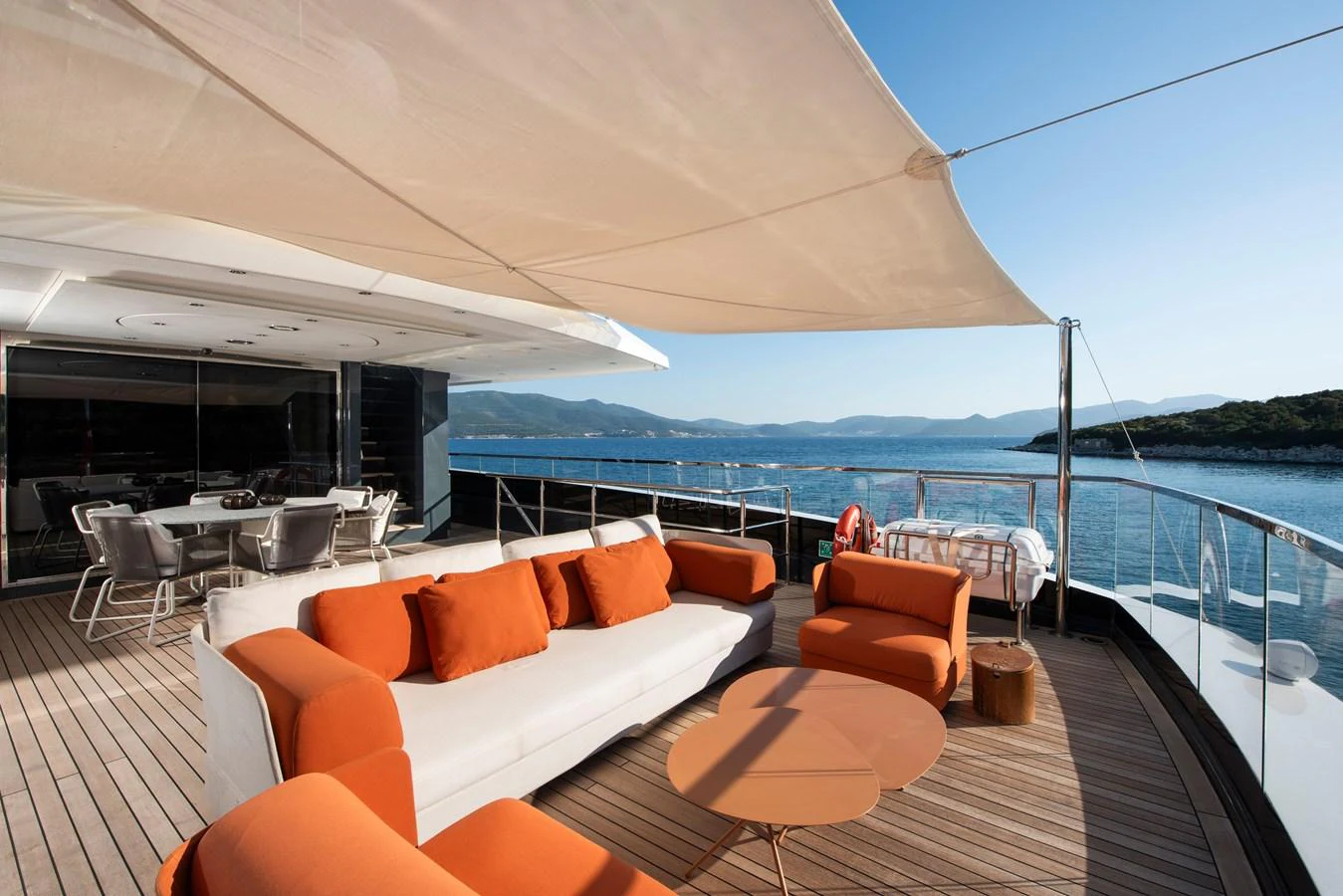 The aft deck features comfortable seating with stunning views of the surrounding waters. aboard K Yacht for Sale