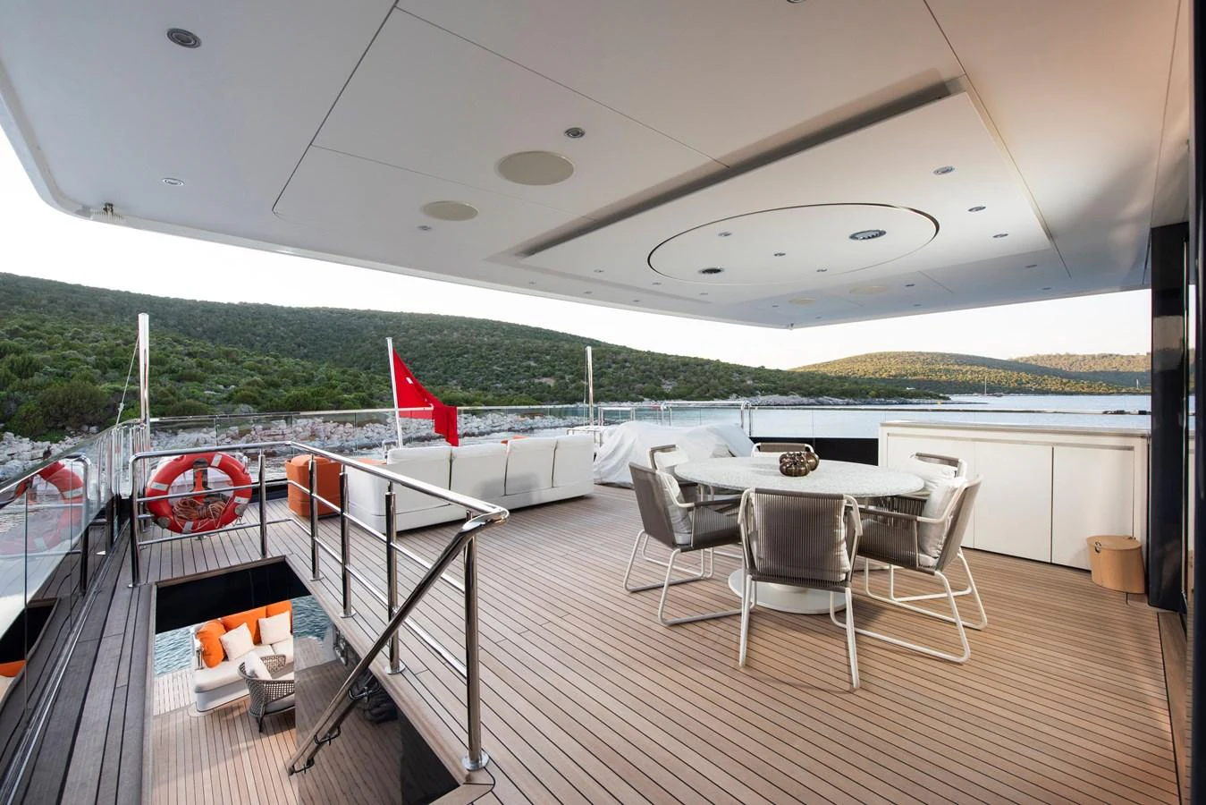 The aft deck offers a spacious and inviting area for alfresco dining and relaxation with stunning views. aboard K Yacht for Sale