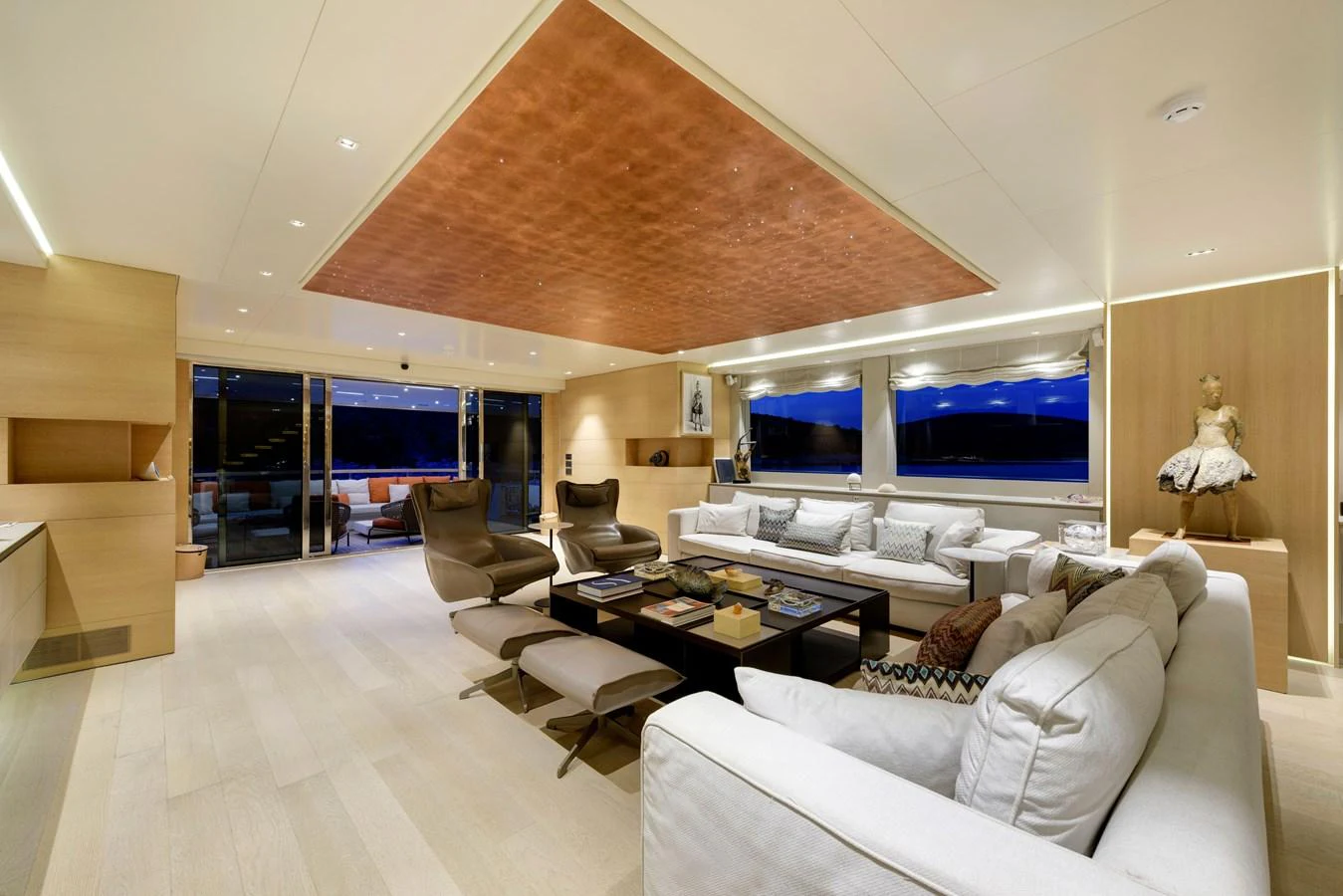 The spacious salon features luxurious seating and modern decor, perfect for relaxation and entertainment. aboard K Yacht for Sale
