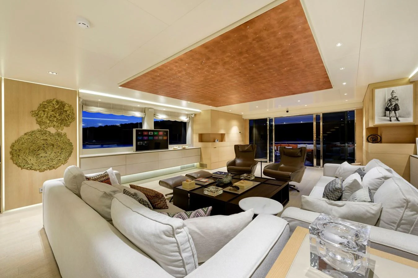 The salon offers a spacious and luxurious seating area with modern decor and ample natural light. aboard K Yacht for Sale