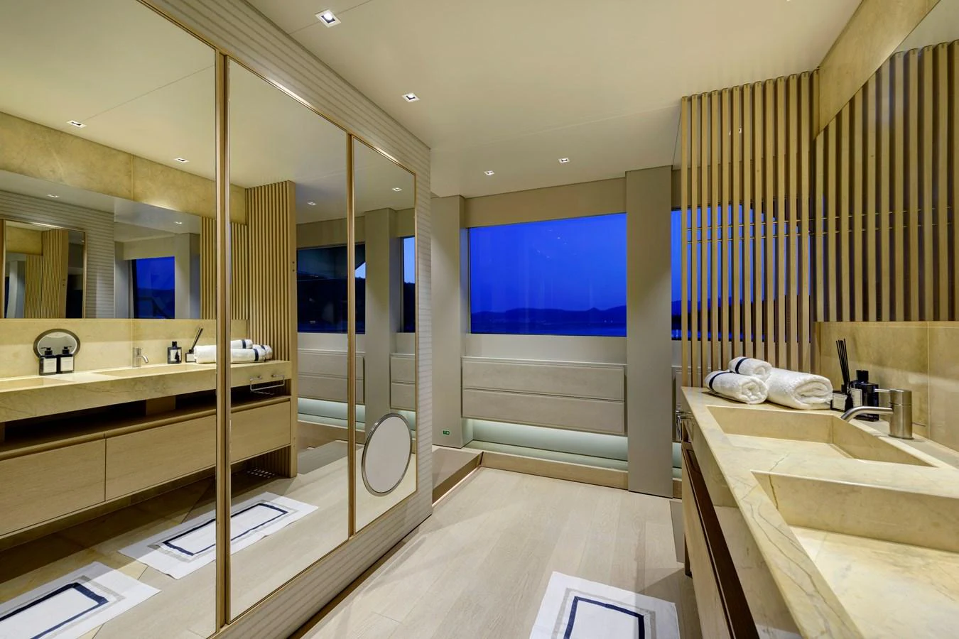 The yacht's bathroom features modern design with ample lighting and luxurious fixtures. aboard K Yacht for Sale