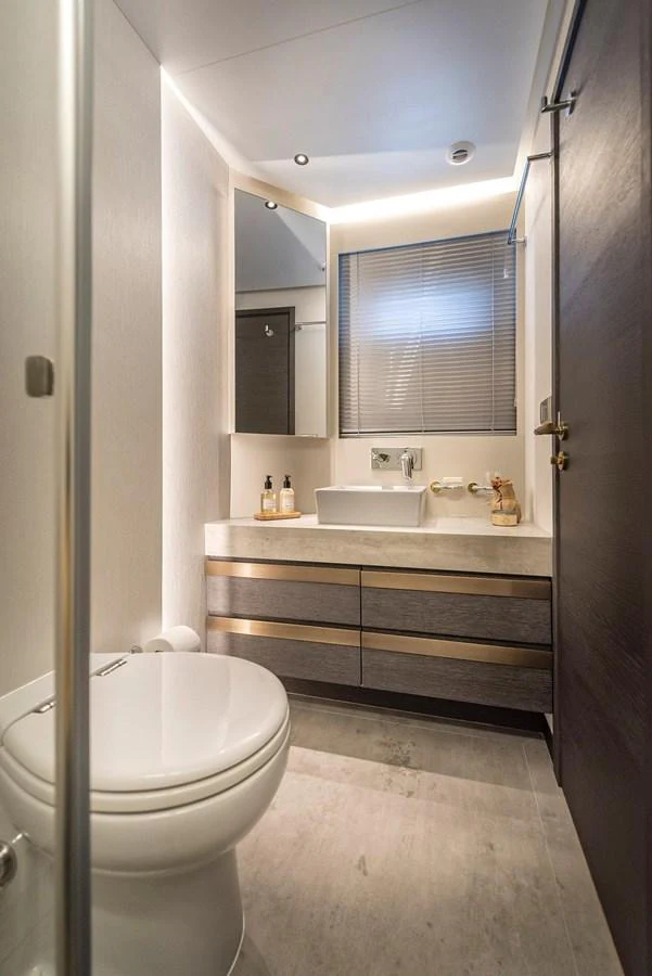 The yacht's bathroom features modern fixtures and a sleek design. aboard KAMOKA Yacht for Sale