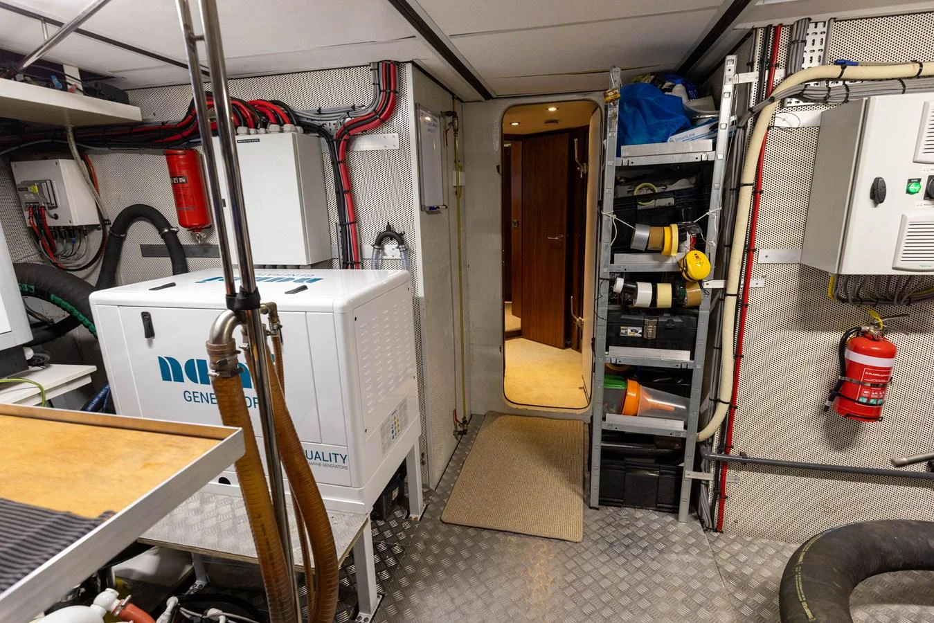 The engine room is well-organized with essential equipment and safety features. aboard DUTCHESS Yacht for Sale