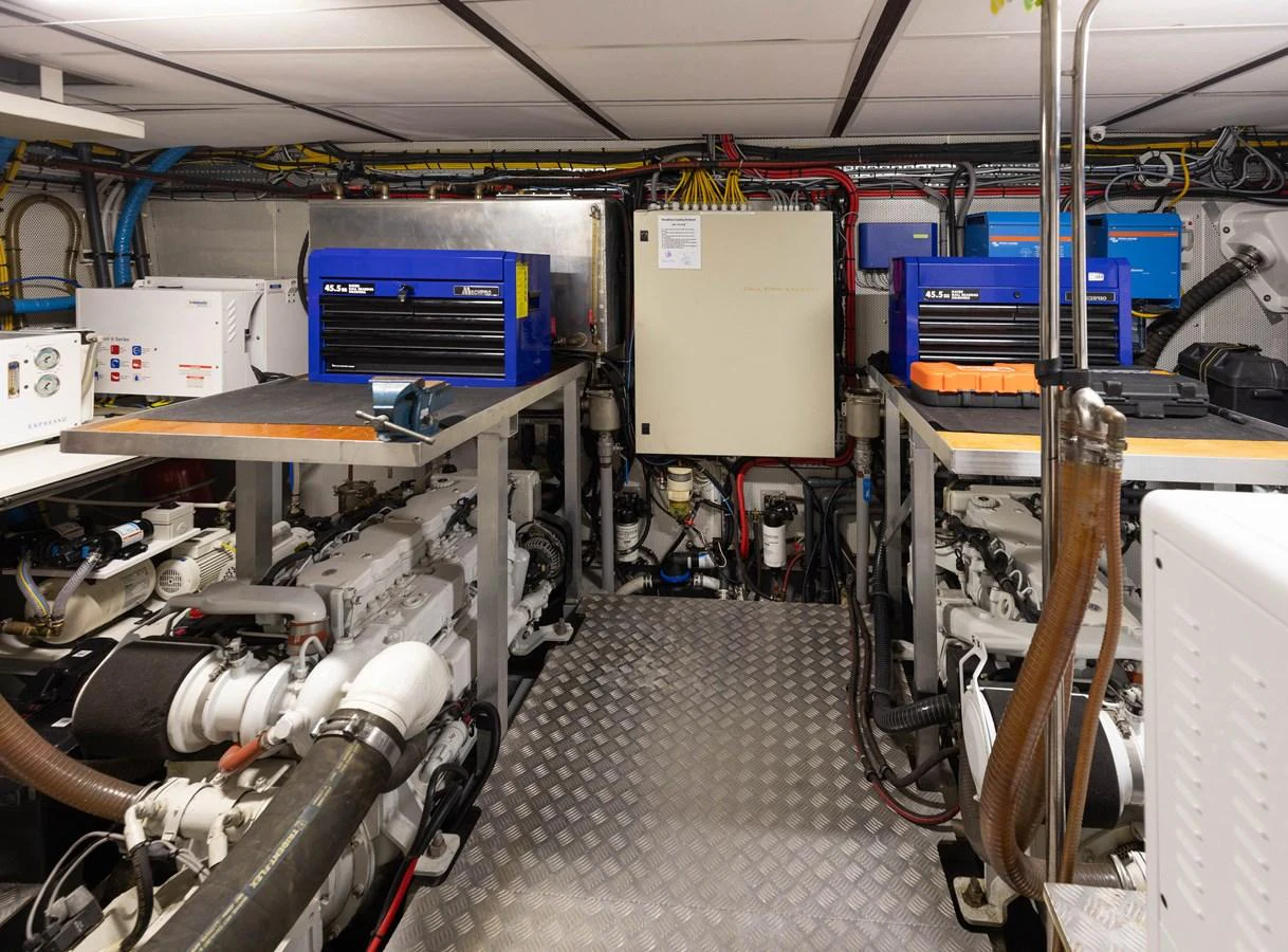 The engine room is well-organized with essential machinery and tools. aboard DUTCHESS Yacht for Sale