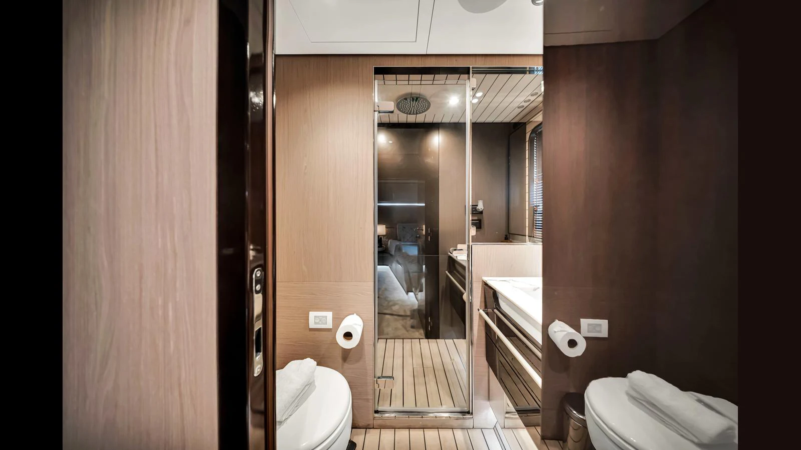 The yacht's bathroom features modern fixtures and a sleek design. aboard CLOUD 9 Yacht for Sale