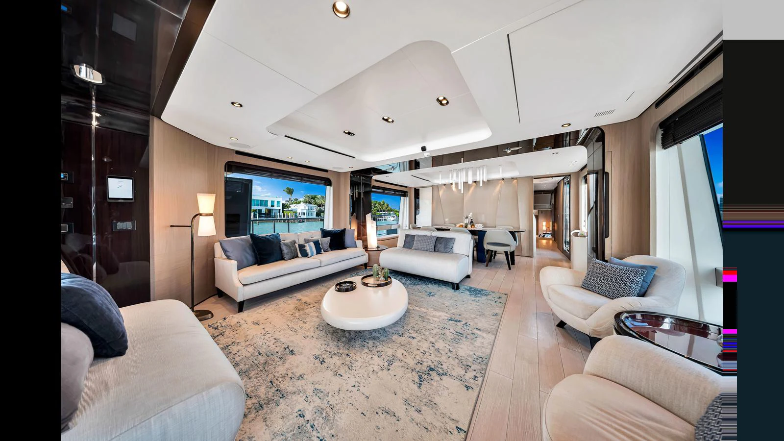 The yacht's salon exudes elegance with its spacious seating area and modern decor. aboard CLOUD 9 Yacht for Sale