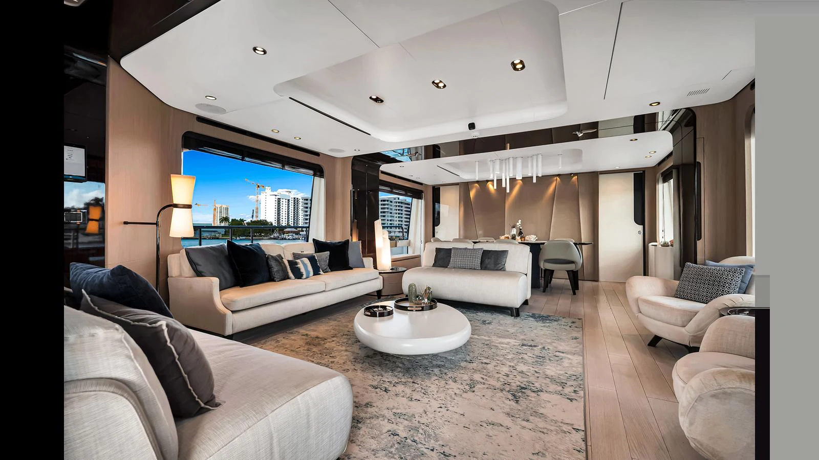 The salon features a spacious and modern design with luxurious seating and elegant decor. aboard CLOUD 9 Yacht for Sale