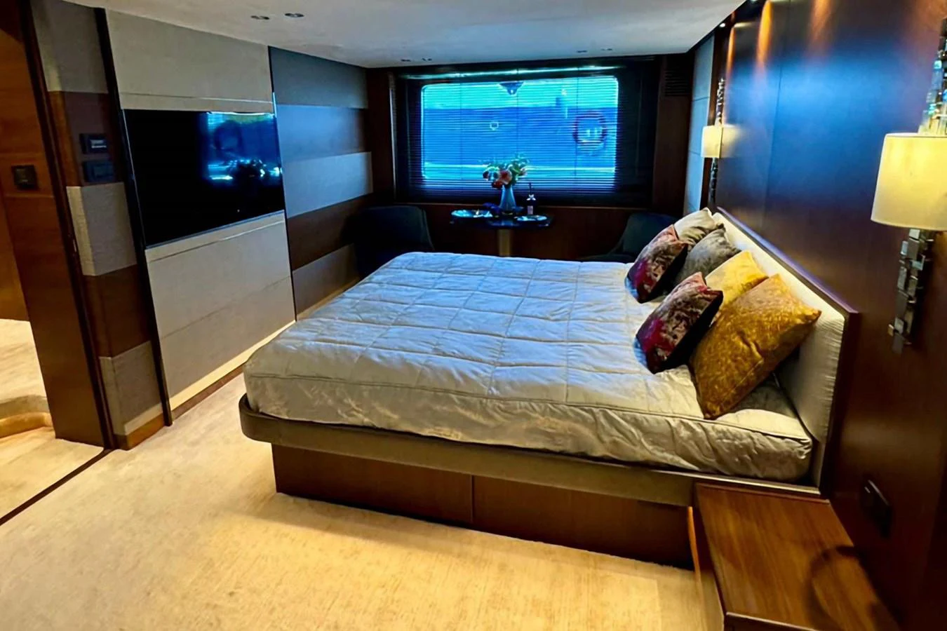The master stateroom features a spacious bed with elegant decor and ample natural light. aboard LADY N Yacht for Sale