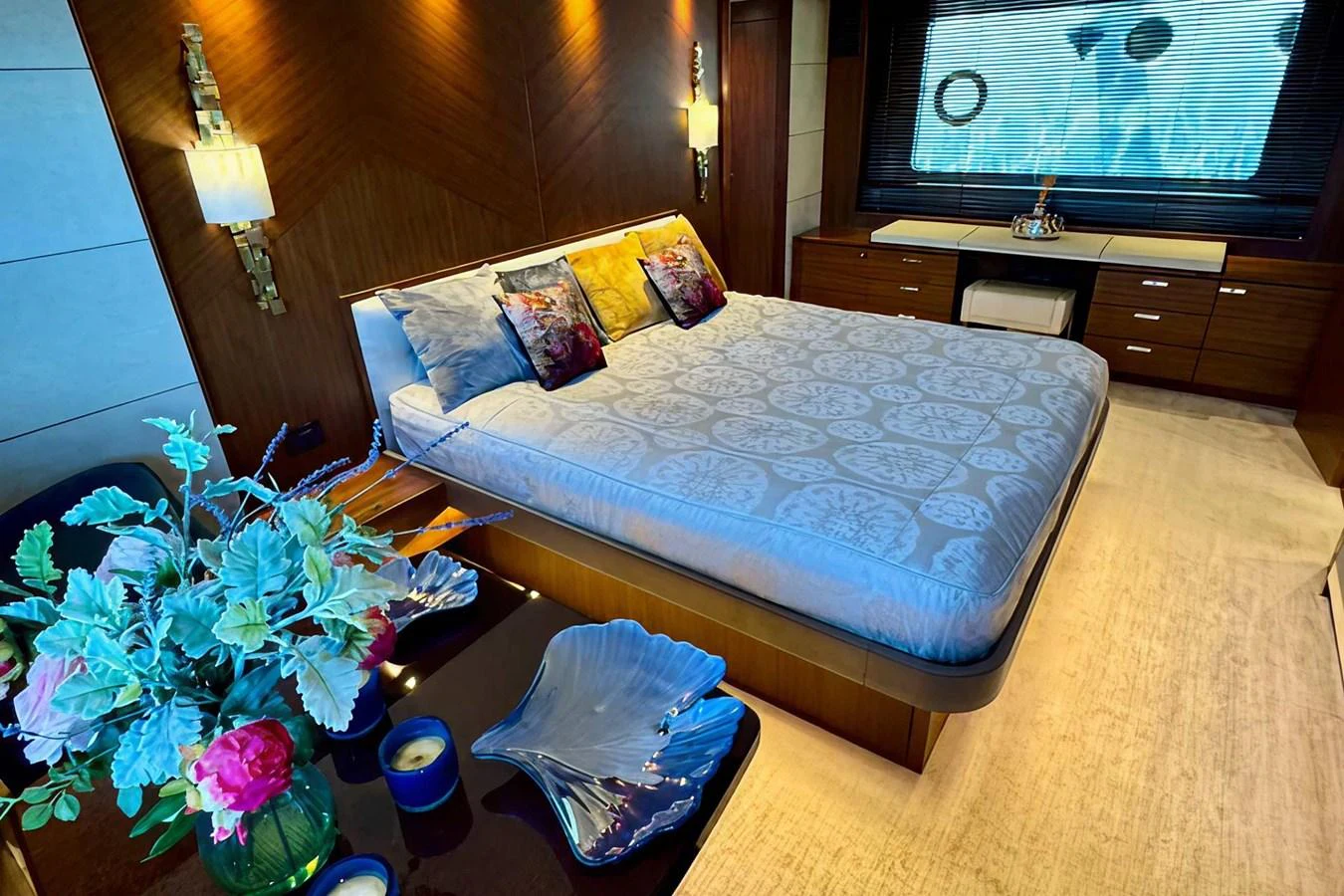 The master stateroom features a luxurious bed with elegant decor and ambient lighting. aboard LADY N Yacht for Sale