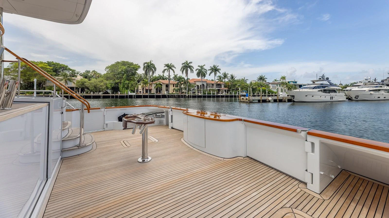 The aft deck offers a spacious and inviting area with beautiful views of the surrounding marina. aboard BAD COMPANY Yacht for Sale